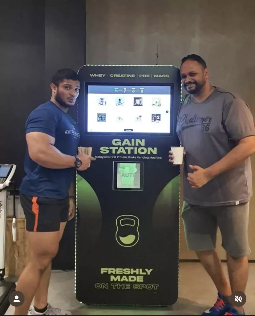 GAIN STATION vending machine with customers